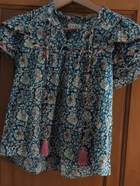Blue Floral Woman's Top with Pink Tassels